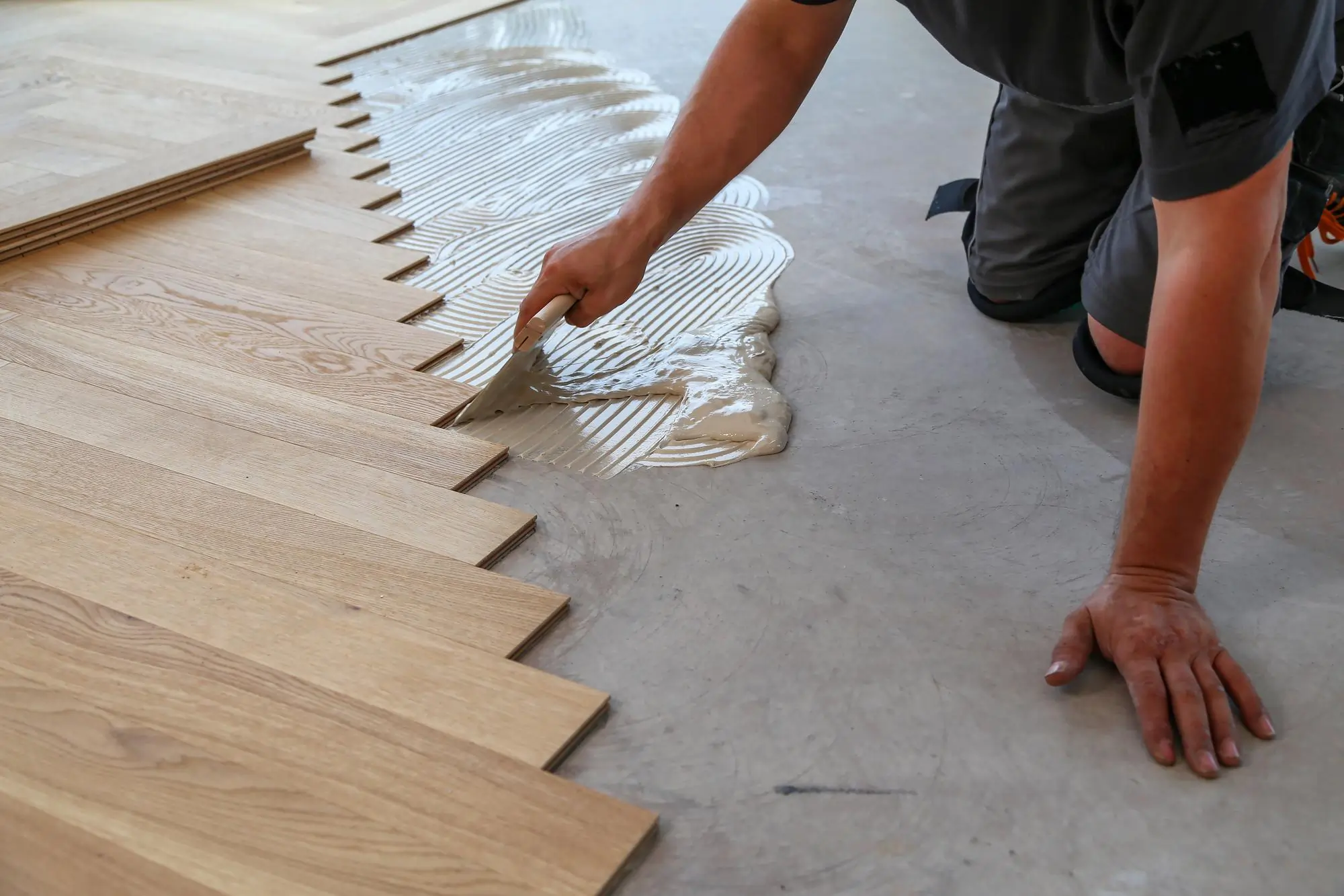Finished RenoSure flooring in a renovated open-plan living space
